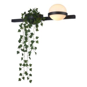 Zidna LED lampa Forma FK2025-17Z BK+WH donosi moderan i elegantan dizajn koji će uneti sofisticiranost u svaki enterijer. Izrađena je od metala u mat crnoj boji, dok su dekorativni elementi u vidu staklenih kugli izrađeni od stakla. Lampa ima integrisani LED izvor svetla snage 17W, sa toplom belom bojom svetla od 3000K, idealnom za stvaranje prijatne i opuštajuće atmosfere. Poseban estetski detalj čini dodatak u vidu plastične imitacije biljke, koji unosi dašak prirode i čini ovu lampu još atraktivnijom. Sa svojom kombinacijom minimalizma i dekorativnih elemenata, savršena je za dnevne sobe, trpezarije ili moderno uređene poslovne prostore.